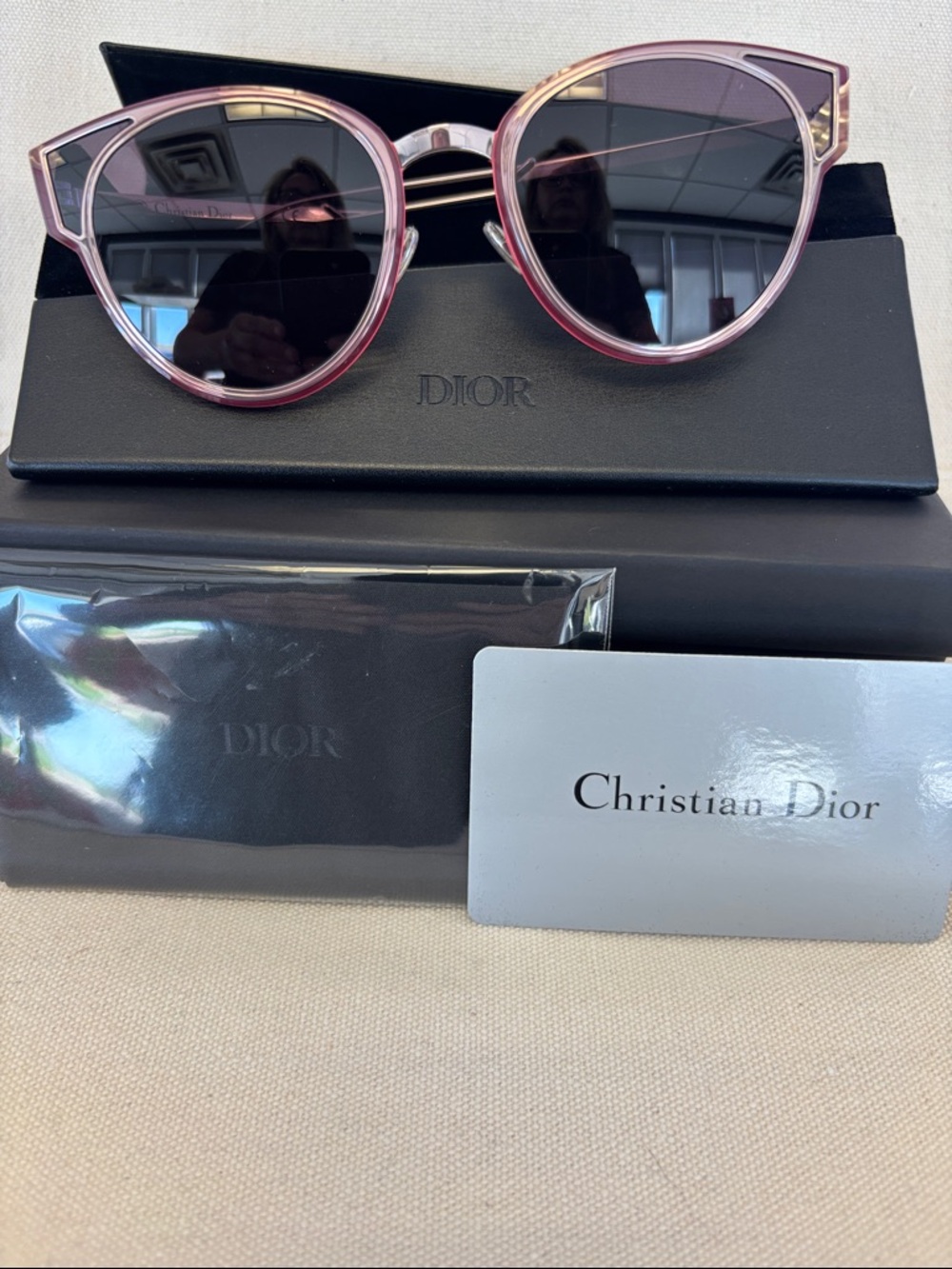 Dior Pink Frame Sunglasses with Metal Accents and Dark Lenses